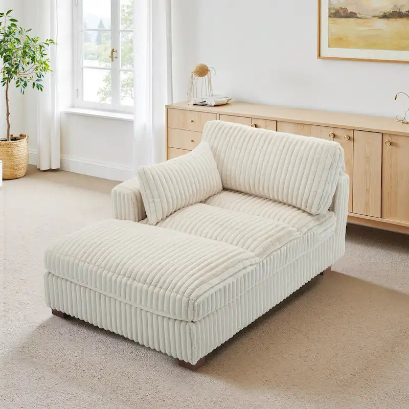 Chaise longue capitonnée avec coussin à ressorts et pieds en bois massif