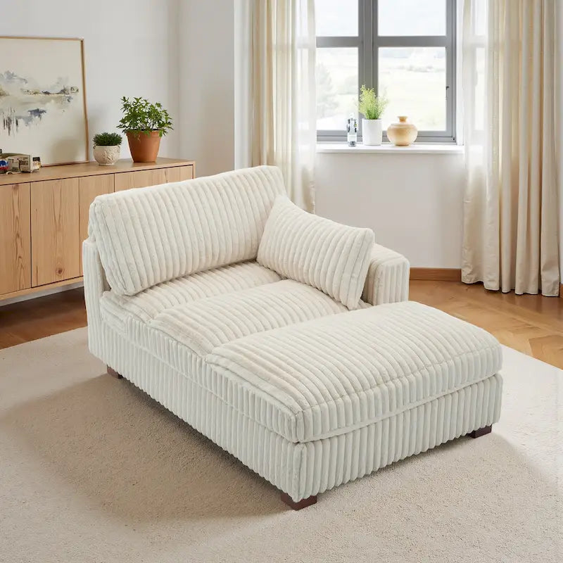 Chaise longue capitonnée avec coussin à ressorts et pieds en bois massif