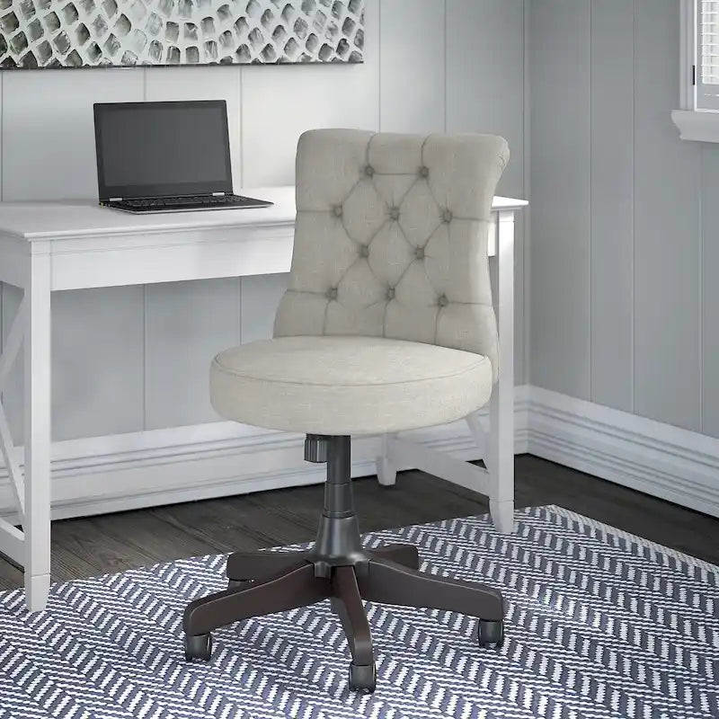 Chaise de bureau sans accoudoirs à dossier mi-haut touffeté et réglable en hauteur