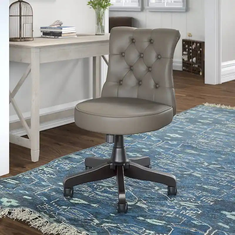 Chaise de bureau sans accoudoirs à dossier mi-haut touffeté et réglable en hauteur