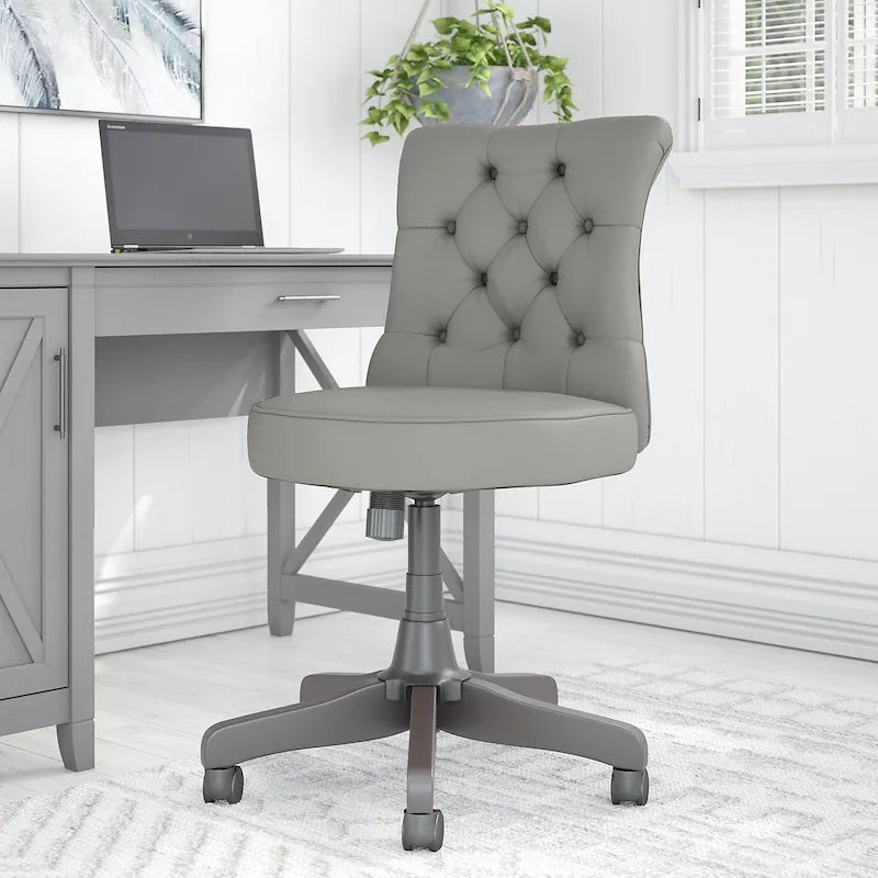 Chaise de bureau sans accoudoirs à dossier mi-haut touffeté et réglable en hauteur
