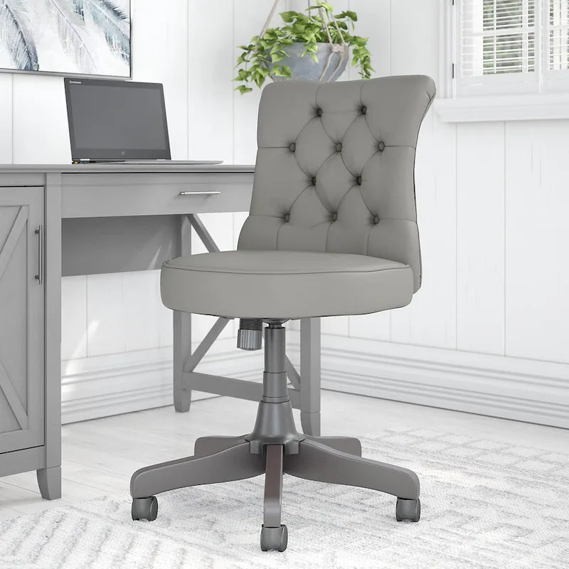 Chaise de bureau sans accoudoirs à dossier mi-haut touffeté et réglable en hauteur