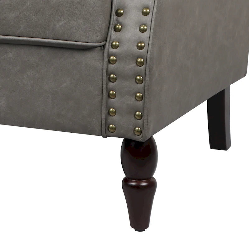 Fauteuil d'appoint en similicuir avec accoudoirs roulés et garniture cloutée – Chaise de salon classique avec pieds en bois massif